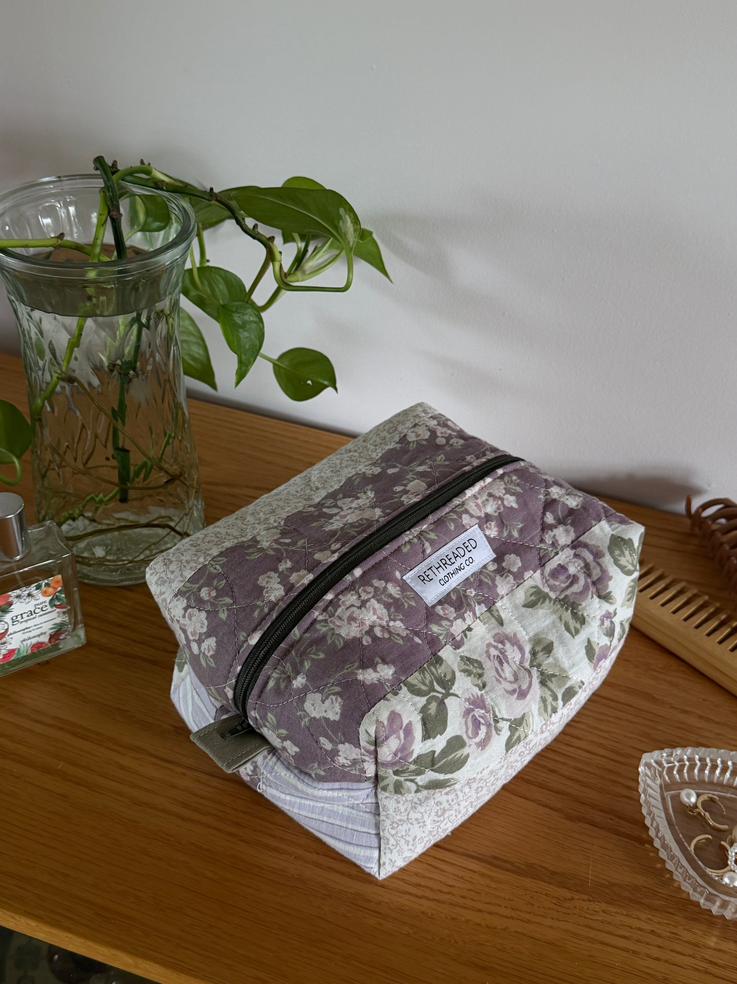 purple quilted makeup bag