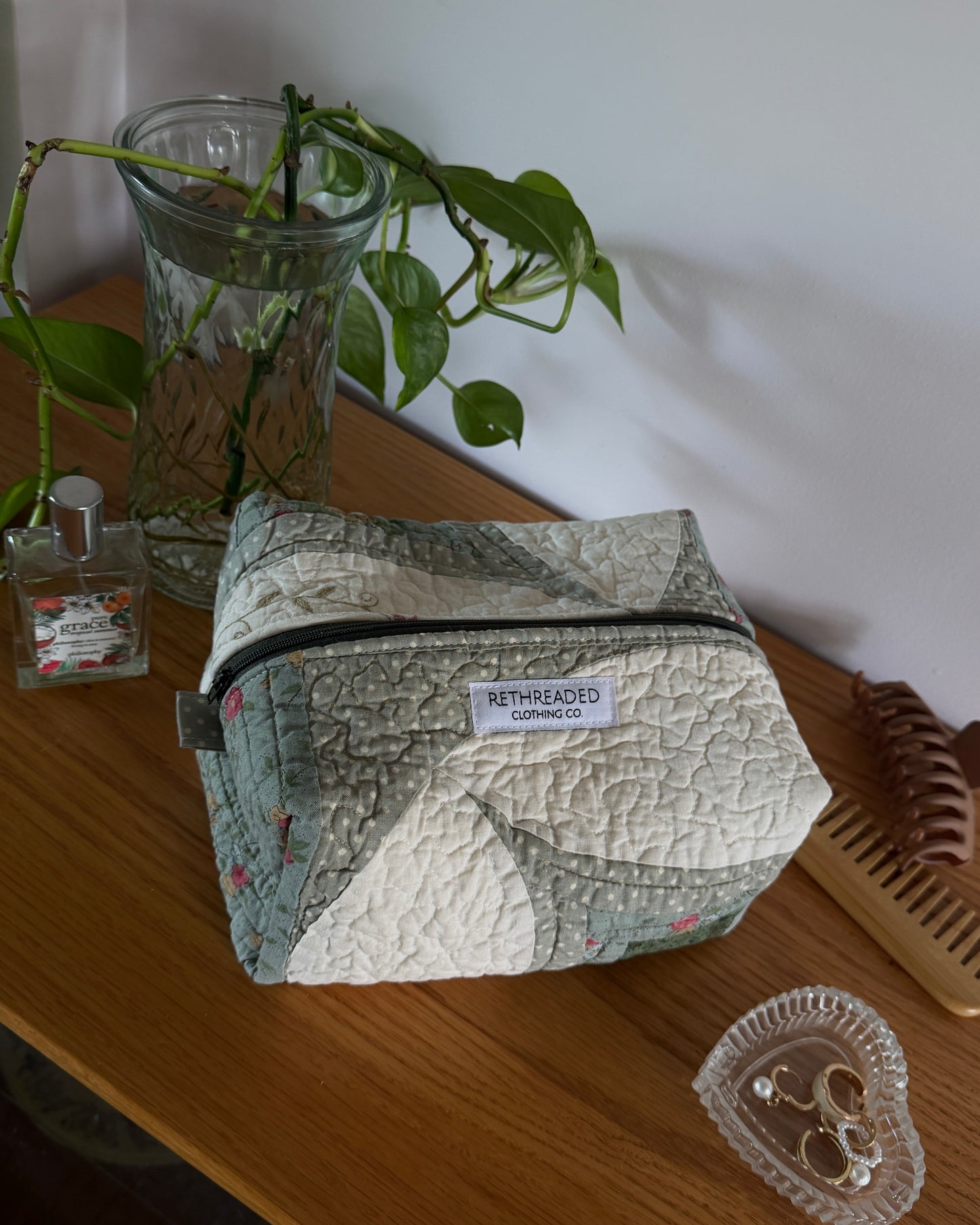 green quilted makeup bag