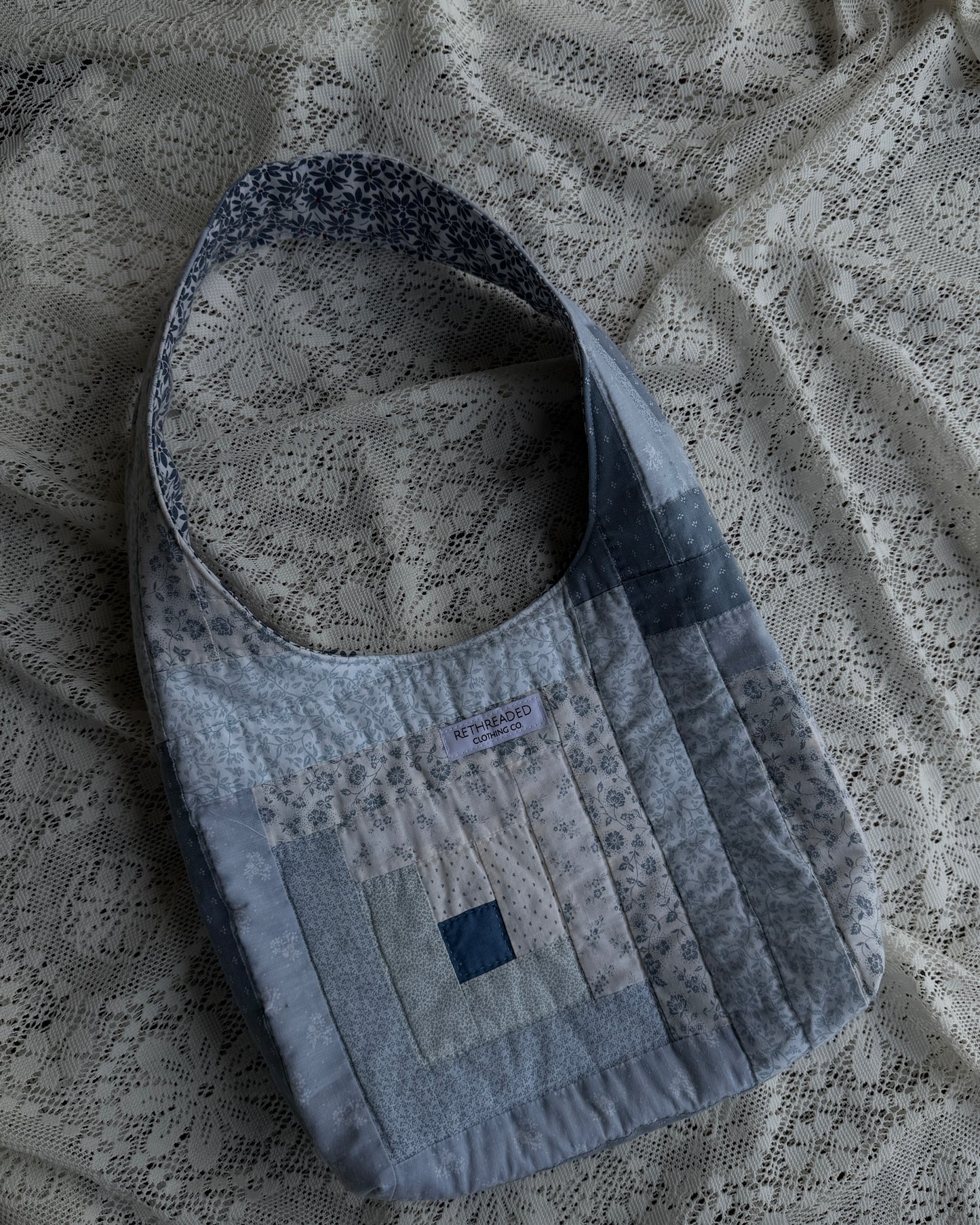 blues quilted hobo bag