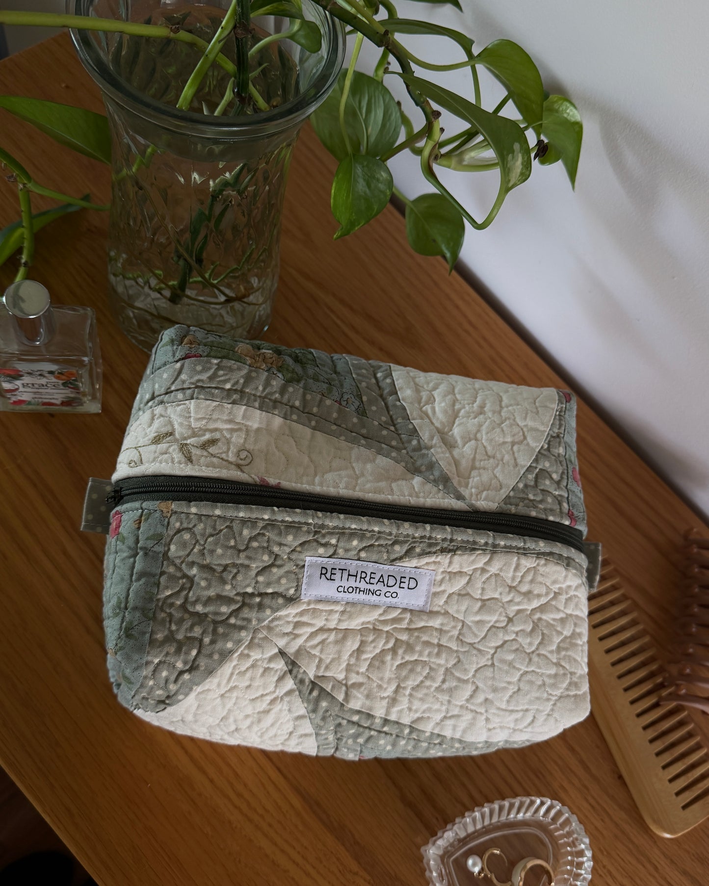 green quilted makeup bag