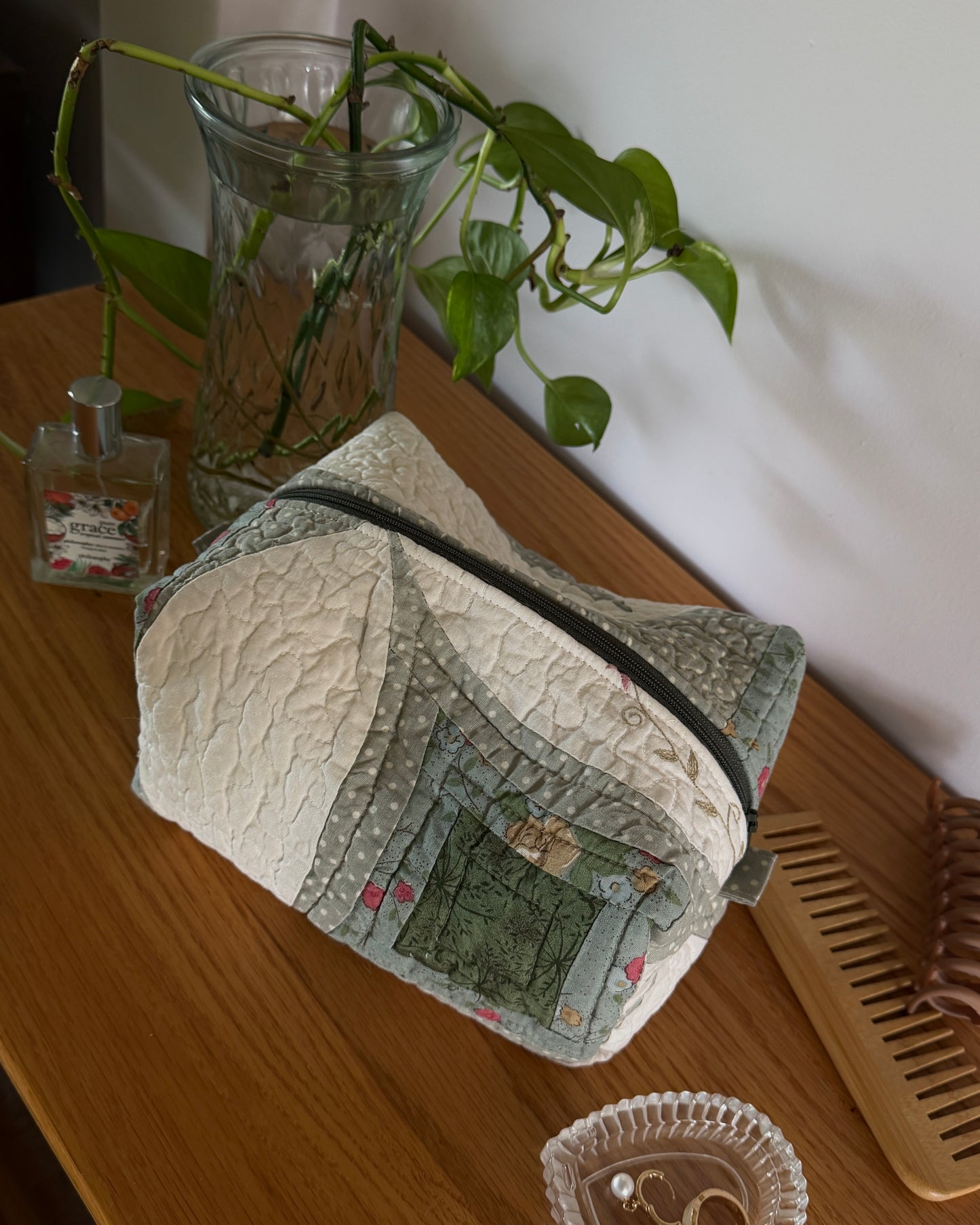 green quilted makeup bag