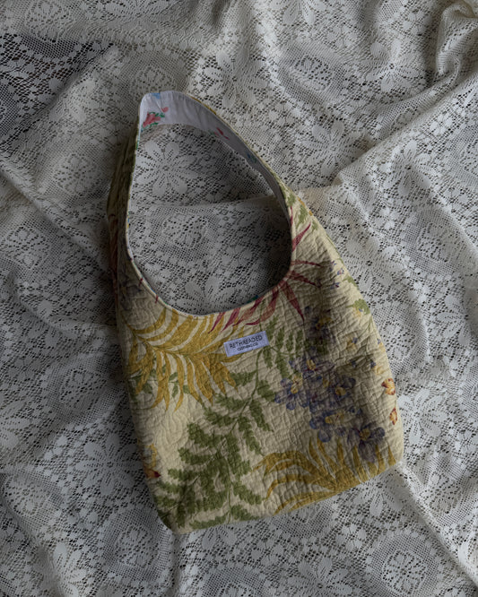 yellow quilted hobo bag