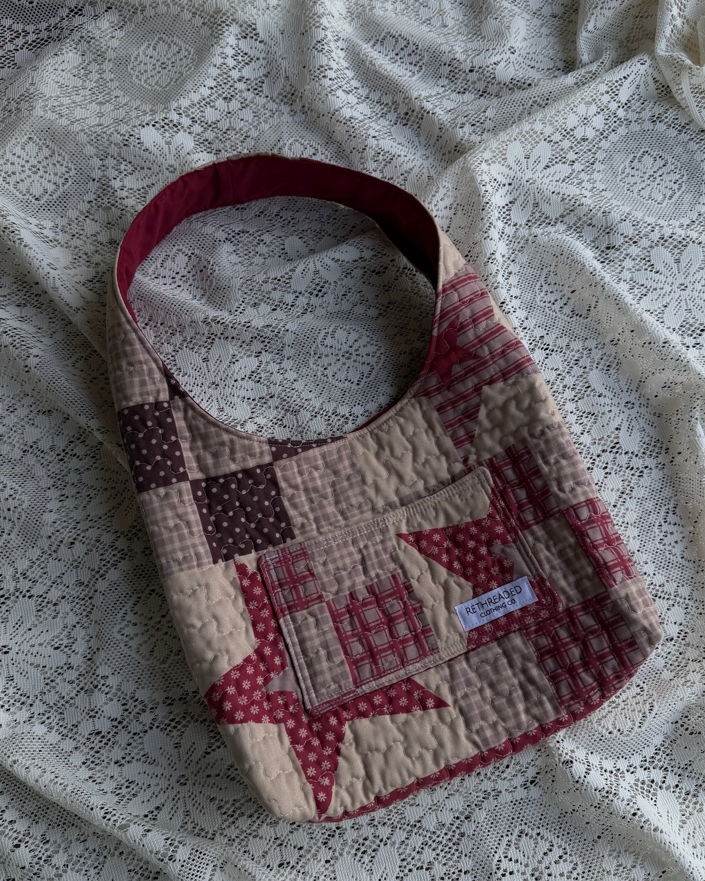 red star quilted hobo bag