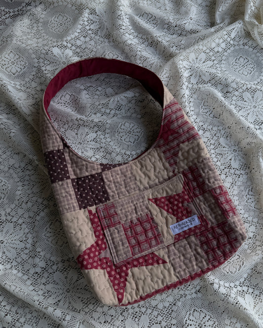 red star quilted hobo bag