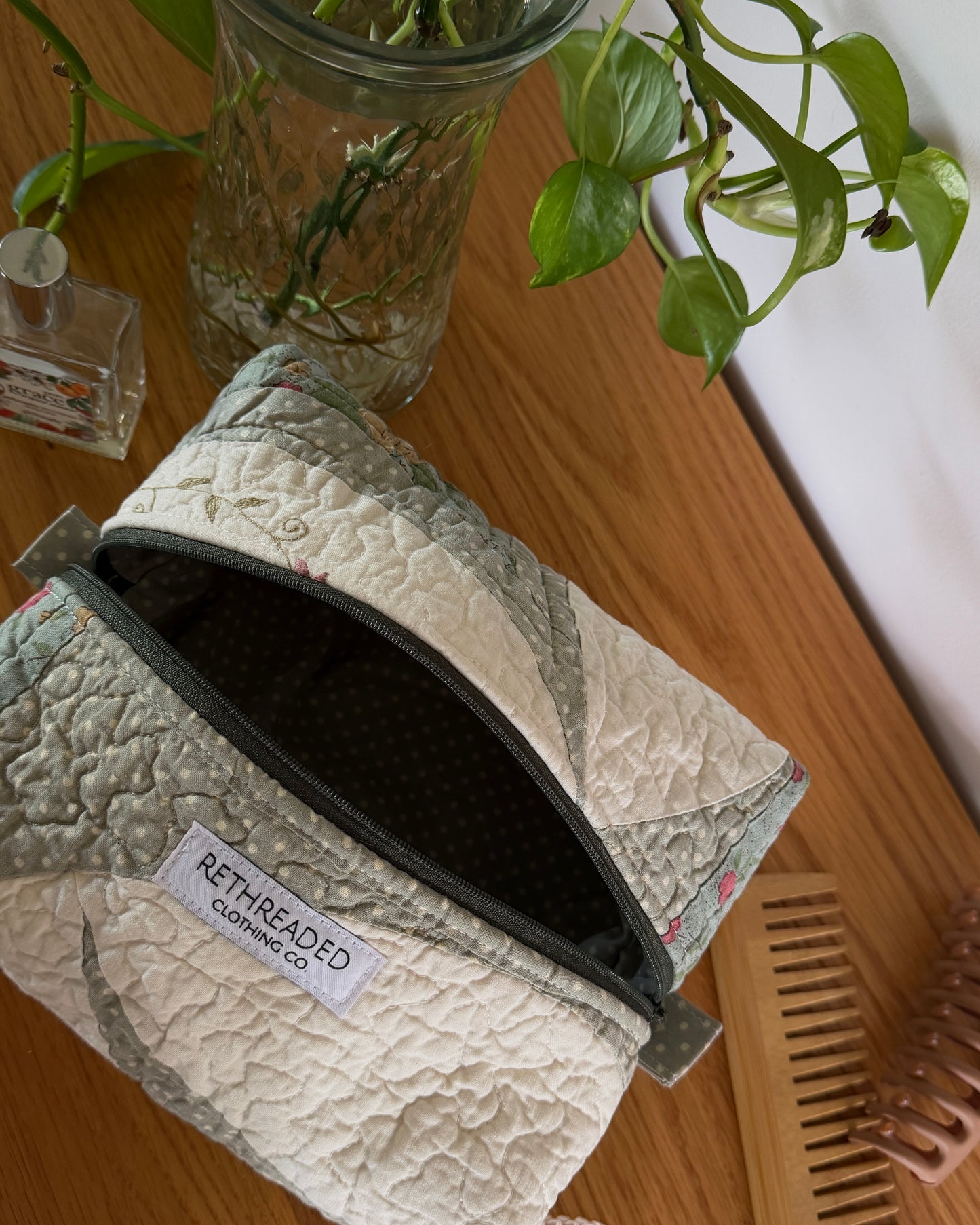green quilted makeup bag