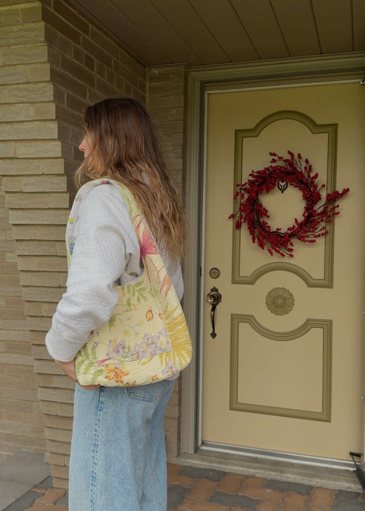 yellow quilted hobo bag