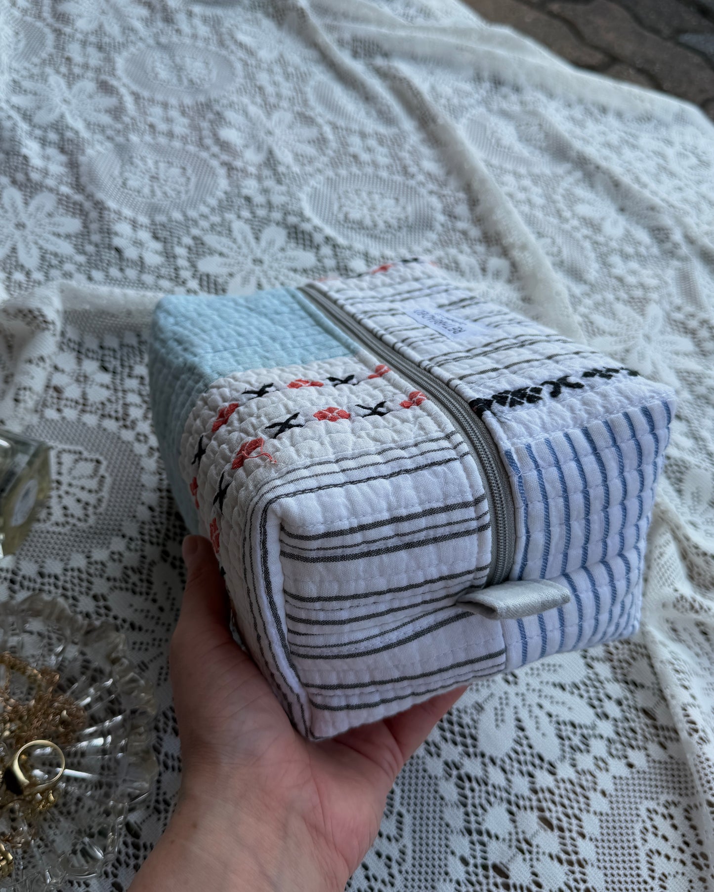 striped makeup bag