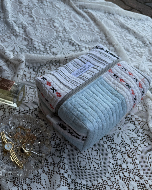 striped makeup bag