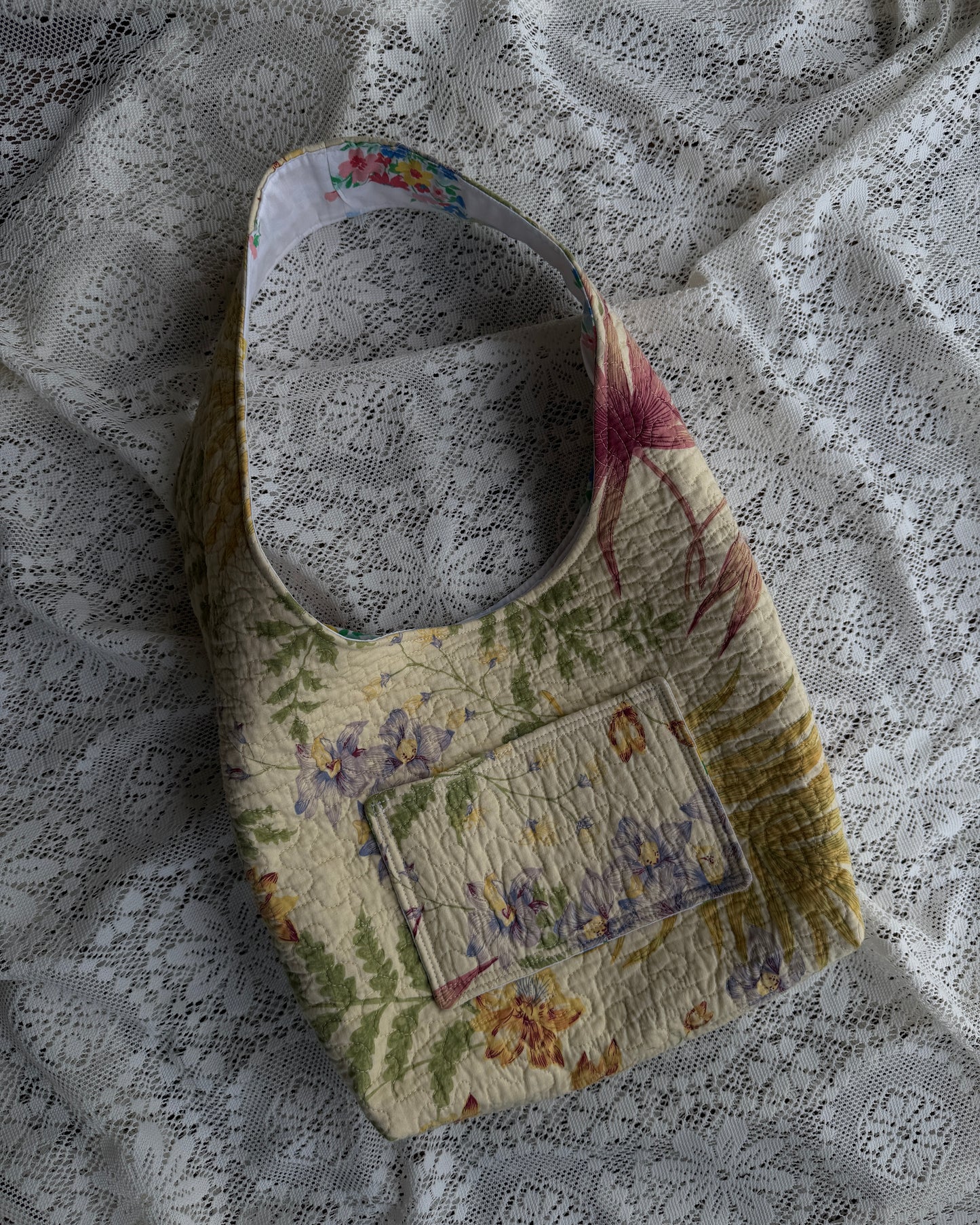 yellow quilted hobo bag