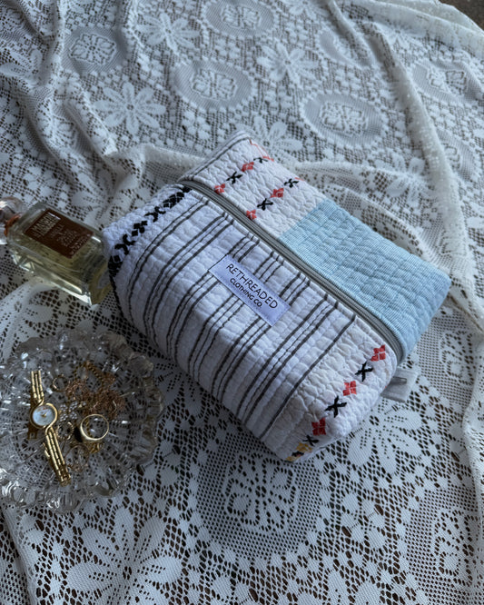 striped makeup bag